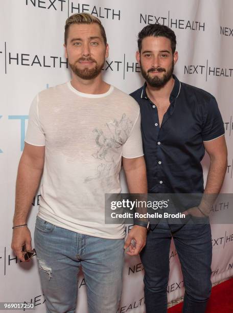 Lance Bass and Michael Turchin arrive at the Next Health Grand Opening at the Westfield, Century City on June 6, 2018 in Los Angeles, California.