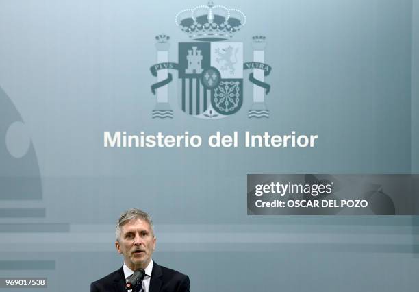 The new Spanish interior minister Fernando Grande-Marlaska speaks during the portfolio handover ceremony at the Interior Ministry headquarters in...