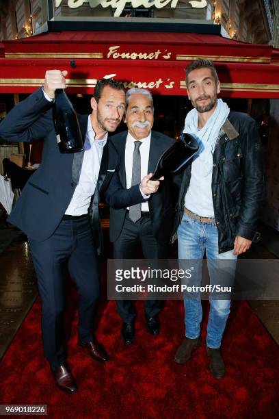 Michael Llodra, Mansour Bahrami and Nicolas Escude attend "Diner des Legendes" at Le Fouquet's on June 6, 2018 in Paris, France.