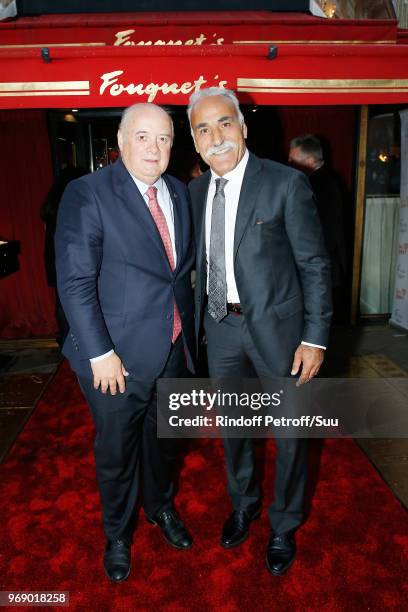 President of FFTennis Bernard Giudicelli and Mansour Bahrami attend "Diner des Legendes" at Le Fouquet's on June 6, 2018 in Paris, France.