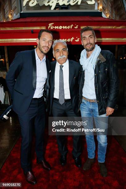 Michael Llodra, Mansour Bahrami and Nicolas Escude attend "Diner des Legendes" at Le Fouquet's on June 6, 2018 in Paris, France.