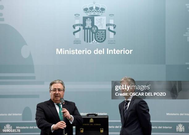 Spanish interior minister Fernando Grande-Marlaska and former minister Juan Ignacio Zoido attend the portfolio handover ceremony at the Interior...