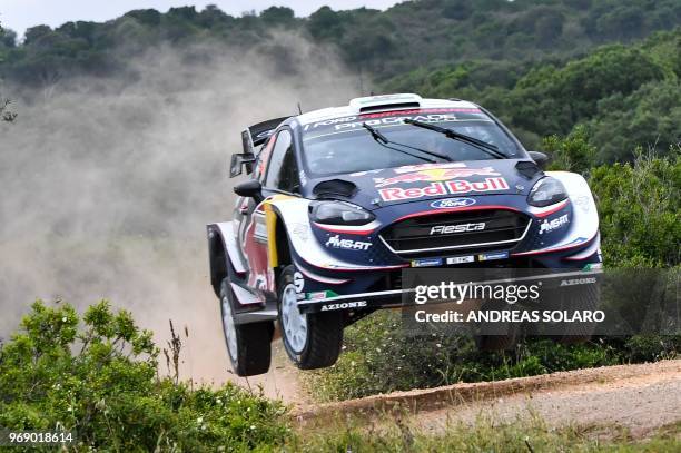 British driver Elfyn Evans and compatriot co-driver Daniel Barritt steer their Ford Fiesta WRC during the shakedown stage of the 2018 FIA World Rally...