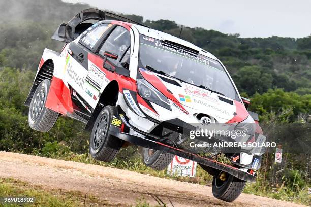 Finnish driver Jari-Matti Latvala and compatriot co-driver Miikka Anttila drive their Toyota Yaris WRC during the shakedown stage of the 2018 FIA...