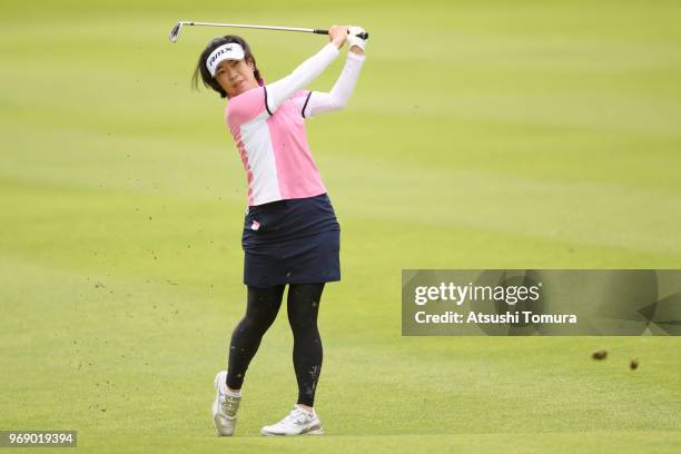 Shiho Oyama of Japan hits her second shot on the 9th hole during the first round of the Suntory Ladies Open Golf Tournament at the Rokko Kokusai Golf...