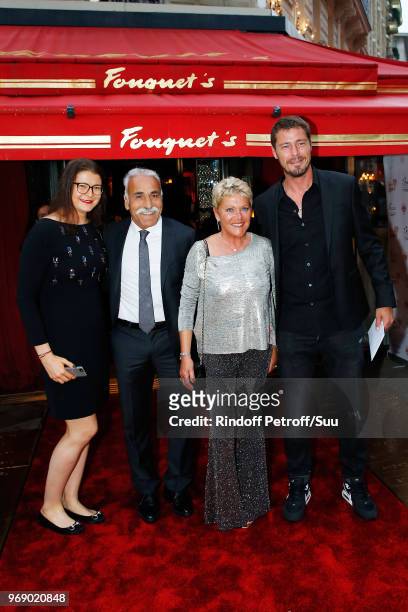 Guest, Mansour Bahrami, Frederique Bahrami and Marat Safin attend "Diner des Legendes" at Le Fouquet's on June 6, 2018 in Paris, France.