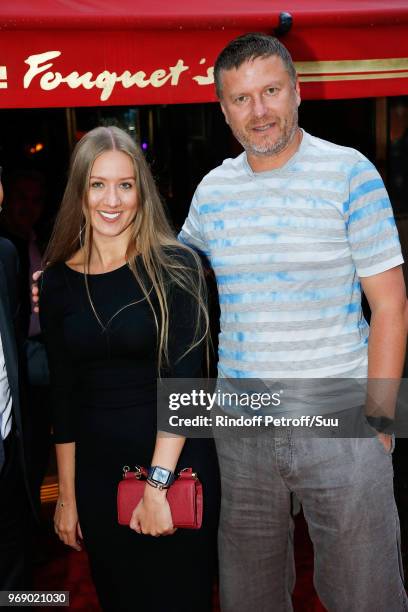 Yevgeny Kafelnikov and guest attend "Diner des Legendes" at Le Fouquet's on June 6, 2018 in Paris, France.