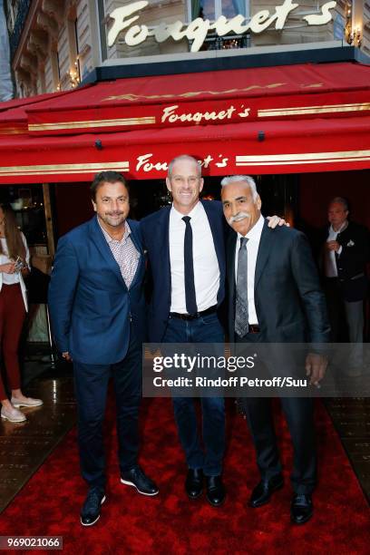 Henri Leconte, Guy Forget and Mansour Bahrami attend "Diner des Legendes" at Le Fouquet's on June 6, 2018 in Paris, France.