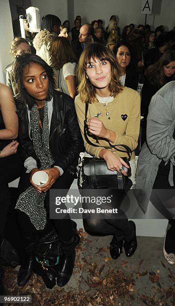 Remi Nicole and Alexa Chung back stage at the Topshop Unique show in Covent Garden on February 20, 2010 in London, England.