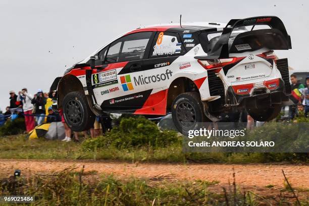 Estonian driver Ott Tanak and his compatriot and co-driver Martin Jarveoja steer Toyota Yaris WRC, during the shakedown stage of the 2018 FIA World...