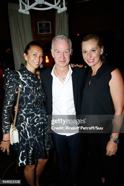 Iva Majoli, John McEnroe and Barbara Schett attend "Diner des Legendes" at Le Fouquet's on June 6, 2018 in Paris, France.