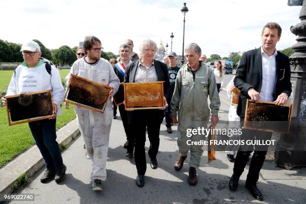 French European Parliament deputy Yannick Jadot and Senator of the Morbihan department Joel Labbe take part in a demonstration at the Esplanade des...