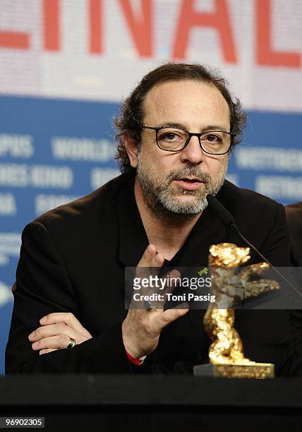Director Semih Kaplanoglu poses with the Golden Bear For Best Movie fro 'Bal' at the 'Award Winners' Photocall during day ten of the 60th Berlin...