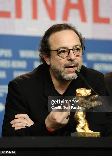 Director Semih Kaplanoglu poses with the Golden Bear For Best Movie fro 'Bal' at the 'Award Winners' Photocall during day ten of the 60th Berlin...