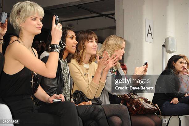 Pixie Geldof, Remi Nicole and Alexa Chung in the front row at the Topshop Unique show in Covent Garden on February 20, 2010 in London, England.