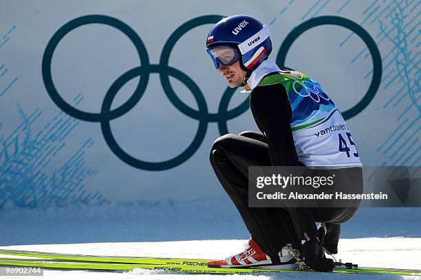 Adam Malysz of Poland after jumping the Large Hill on day 9 of the 2010 Vancouver Winter Olympics at Ski Jumping Stadium on February 20, 2010 in...