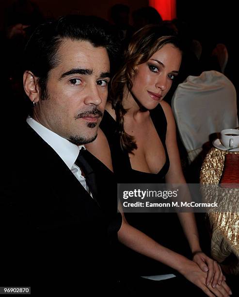 Colin Farrell and girlfriend Alicja Bachleda-Curus watch the ceremony at The 7th Annual Irish Film And Television Awards, at the Burlington Hotel on...