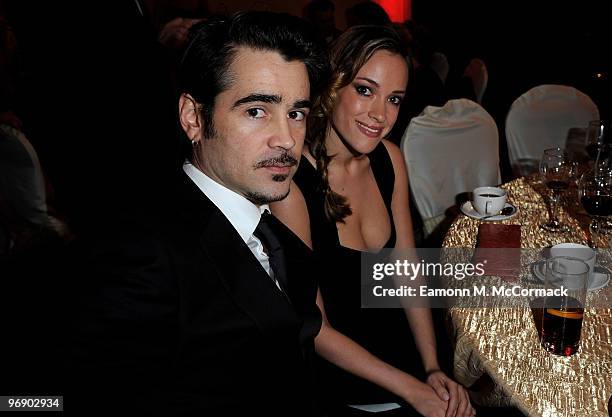 Colin Farrell and girlfriend Alicja Bachleda-Curus watch the ceremony at The 7th Annual Irish Film And Television Awards, at the Burlington Hotel on...