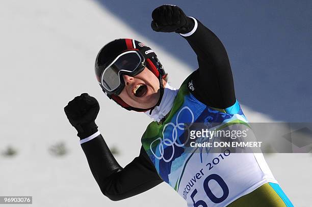 Switzerland's Simon Ammann reacts after a jump in the men's Ski Jumping Individual LH at the Whistler Olympic Park during the Vancouver Winter...