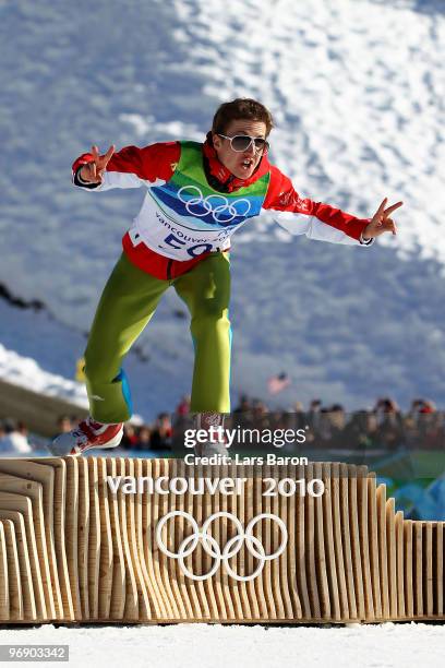 Simon Ammann of Switzerland celebrates after winning the Gold medal on the Large Hill during day 9 of the 2010 Vancouver Winter Olympics at Ski...