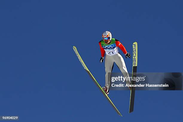 Taku Takeuchi of Japan soars off the Large Hill on day 9 of the 2010 Vancouver Winter Olympics at Ski Jumping Stadium on February 20, 2010 in...