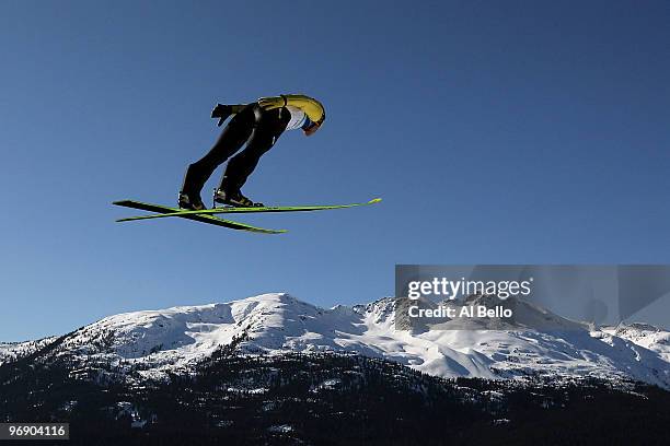 Noriaki Kasai of Japan soars on the Large Hill on day 9 of the 2010 Vancouver Winter Olympics at Ski Jumping Stadium on February 20, 2010 in...
