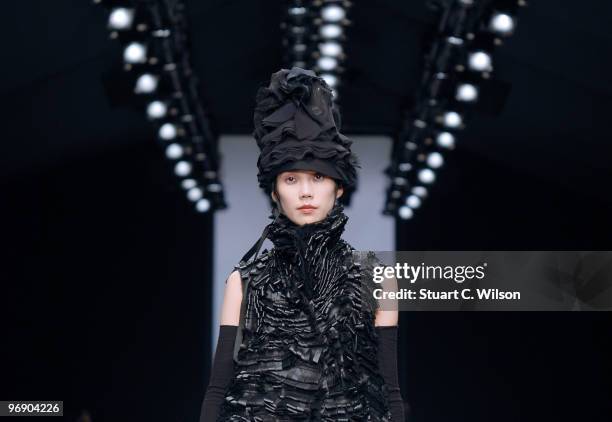 Model walks down the catwalk at the John Rocha show during London Fashion Week on February 20, 2010 in London, England.