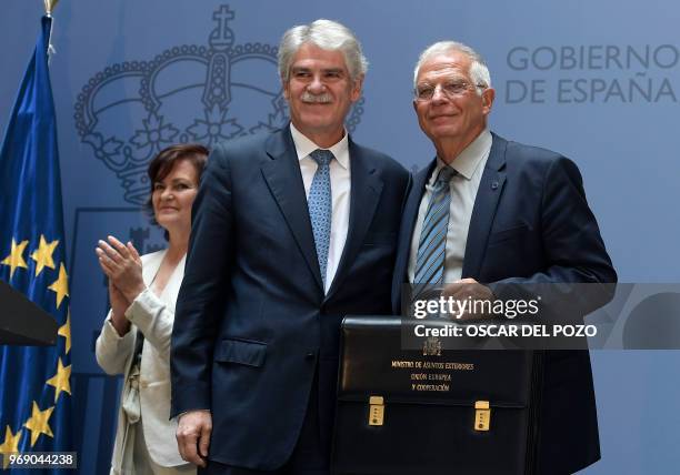 The new Spanish minister of foreign affairs Josep Borrell and former minister of foreign affairs Alfonso Dastis attend the portfolio handover...