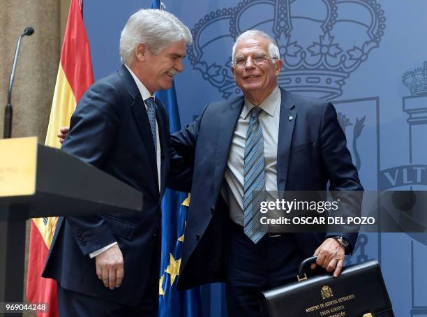 The new Spanish minister of foreign affairs Josep Borrell and former minister of foreign affairs Alfonso Dastis attend the portfolio handover...