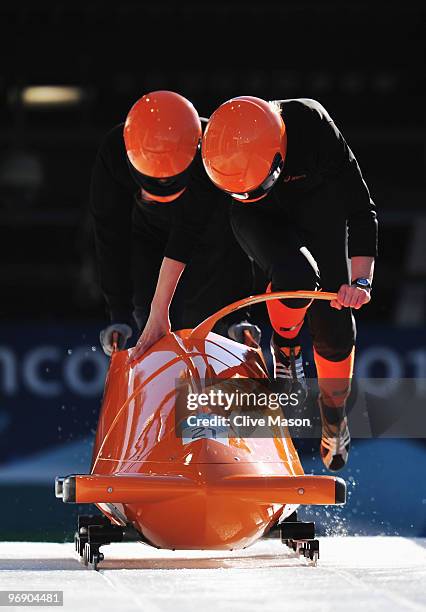 Netherlands 1 piloted by Esme Kamphuis practice during the Women's Two-Man Bobsleigh training on day 9 of the 2010 Vancouver Winter Olympics at the...