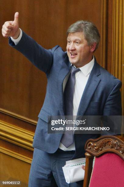 Ukrainian finance minister Oleksandr Danylyuk reacts after he was dismissed by the Ukrainian parliament in Kiev on June 7, 2018. - A total of 254...