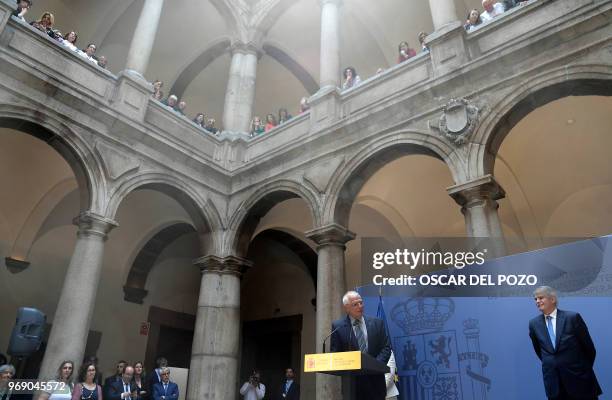 The new Spanish minister of foreign affairs Josep Borrell and former minister of foreign affairs Alfonso Dastis attend the portfolio handover...