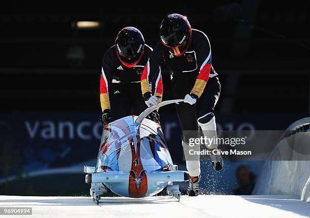 Germany 1 piloted by Sandra Kiriasis practice during the Women's Two-Man Bobsleigh training on day 9 of the 2010 Vancouver Winter Olympics at the...