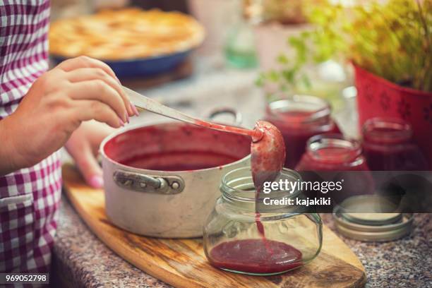 preparing homemade strawberry jam - canning stock pictures, royalty-free photos & images