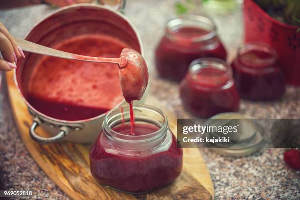 preparing homemade strawberry jam - marmalade stock pictures, royalty-free photos & images