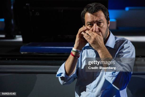Matteo Salvini, Italy's deputy prime minister, talks on his mobile phone as he arrives at the annual general meeting of the Confcommercio retail...