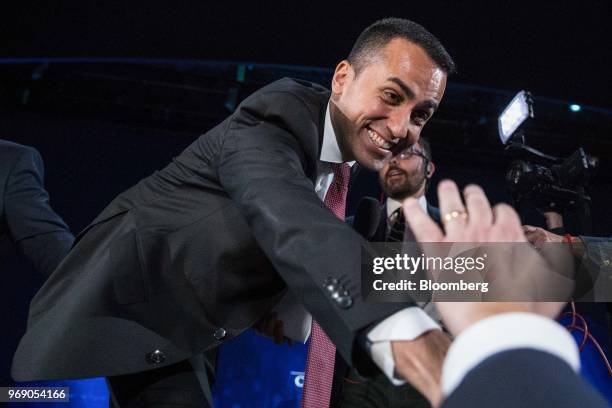 Luigi Di Maio, Italy's deputy prime minister, greets attendees at the end of the annual general meeting of the Confcommercio retail association in...