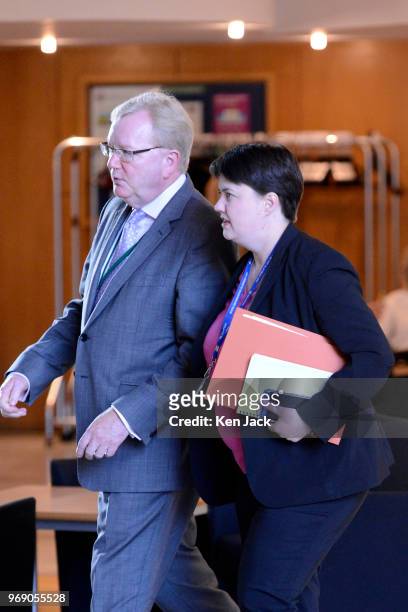 Scottish Conservative leader Ruth Davidson on the way to First Minister's Questions in the Scottish Parliament, accompanied by her deputy Jackson...