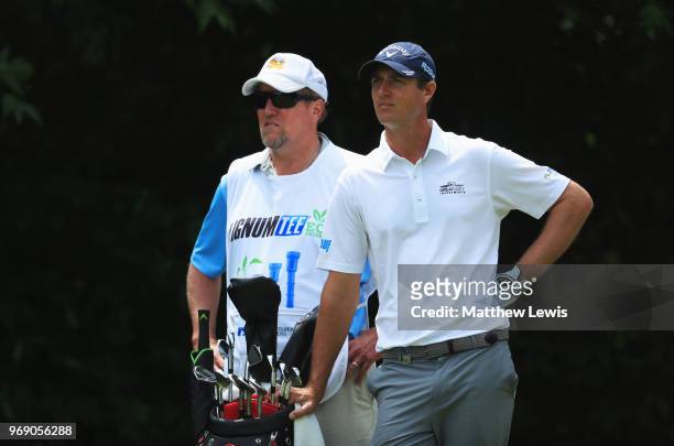 Nicolas Colsaerts of Belgium and his caddie look on during day one of the 2018 Shot Clock Masters at Diamond Country Club on June 7, 2018 in...