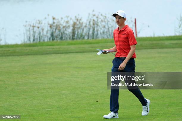 Amateur Tom McKibbin of Northern Ireland walks on the 5th hole fairway during day one of the 2018 Shot Clock Masters at Diamond Country Club on June...