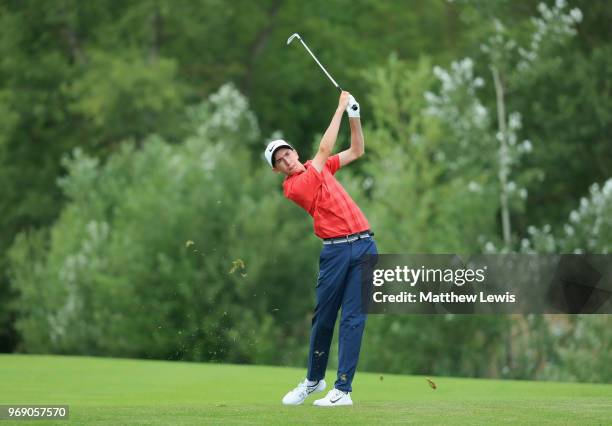 Amateur Tom McKibbin of Northern Ireland plays his second shot on the 4th hole during day one of the 2018 Shot Clock Masters at Diamond Country Club...