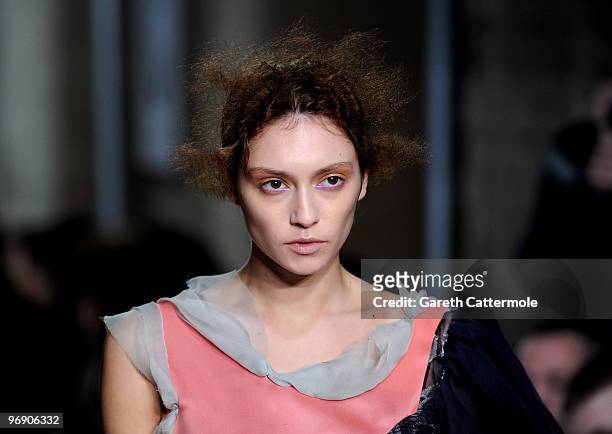 Model walks the runway at the Fashion East show during London Fashion Week at the BFC Show Space at Somerset House on February 20, 2010 in London,...