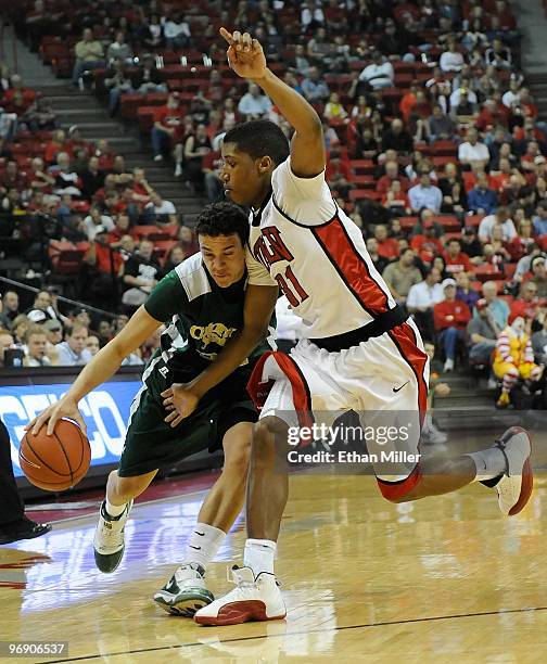 Dorian Green of the Colorado State Rams drives against Justin Hawkins of the UNLV Rebels during their game at the Thomas & Mack Center February 20,...