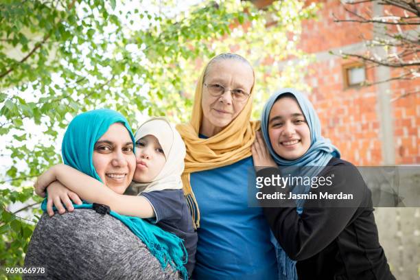 happy three generational family - jasmin merdan stock pictures, royalty-free photos & images