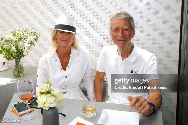 Journalist Jean-Claude Narcy and Alice Bertheaume attend the 2018 French Open - Day Twelve at Roland Garros on June 7, 2018 in Paris, France.