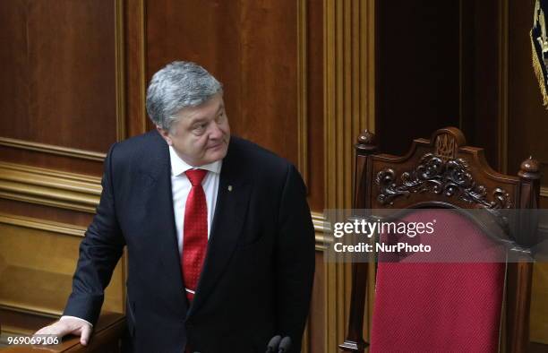 Ukrainian President Petro Poroshenko reacts after voting on a law to establish an anti-corruption court during a parliament session in Kiev. Ukraine,...