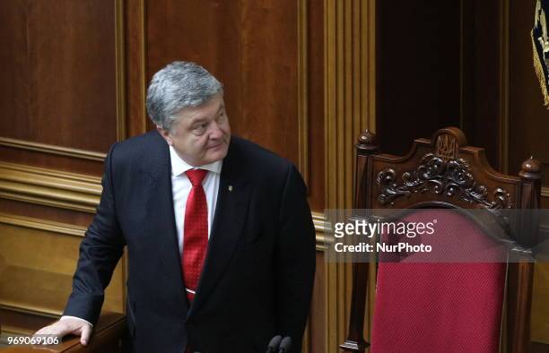 Ukrainian President Petro Poroshenko reacts after voting on a law to establish an anti-corruption court during a parliament session in Kiev. Ukraine,...