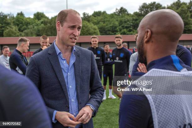 Prince William, Duke of Cambridge chats to England players as he attends the Facility at the FA Training Ground to meet members of the England Squad...