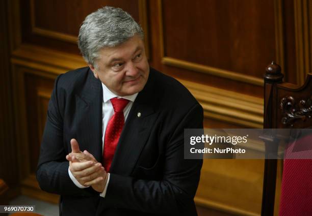 President Petro Poroshenko reacts after the positive voting on the anticorruption court bill during the session of Parliament in Kyiv, Ukraine, June...