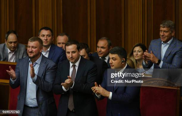 Prime Minister Volodymyr Groysman and other Ministers applause after the positive voting on the anticorruption court bill during the session of...